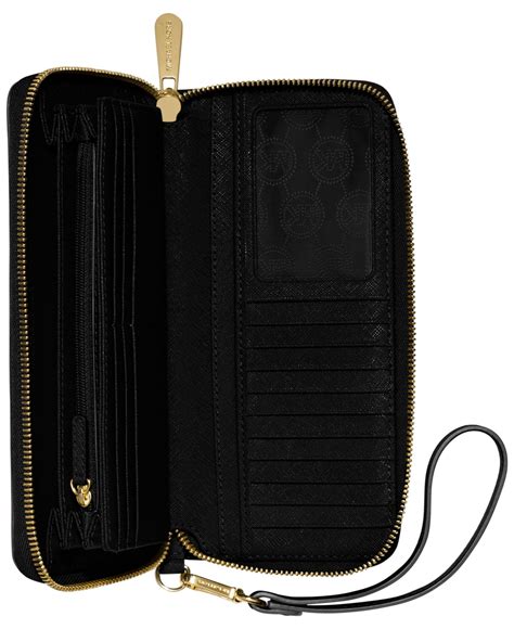 michael kors jet set continental smooth large black wallets|Michael Kors continental wristlet wallet.